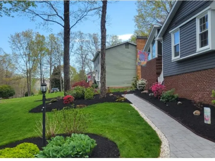 Beds re-edged and topped with fresh dark mulch in Roanoke, VA